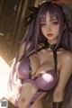 A woman with long purple hair wearing a purple bra and black lingerie.