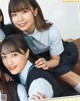 A group of young women in school uniforms posing for a magazine.